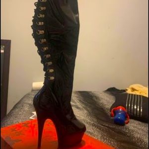 Black tigh high boots